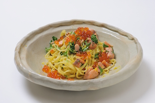Salmon and Mizuna Greens Tagliolini with Notes of Yellow Yuzu Citrus and Generous Serving of Salmon Roe